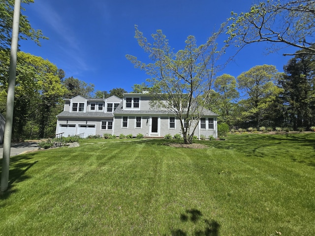 2 Little Cove Ln, Orleans, MA 02653 - view of front of property featuring a garage, a front lawn, and driveway