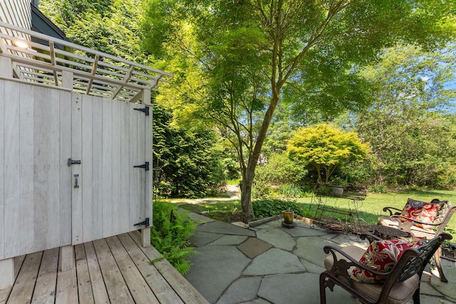 23 Crowell Ln, Tisbury, MA 02568 - view of patio / terrace with view of wooded area