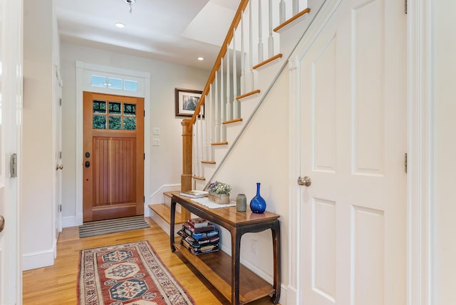 23 Crowell Ln, Tisbury, MA 02568 - entryway featuring light wood-style flooring, stairway, and recessed lighting