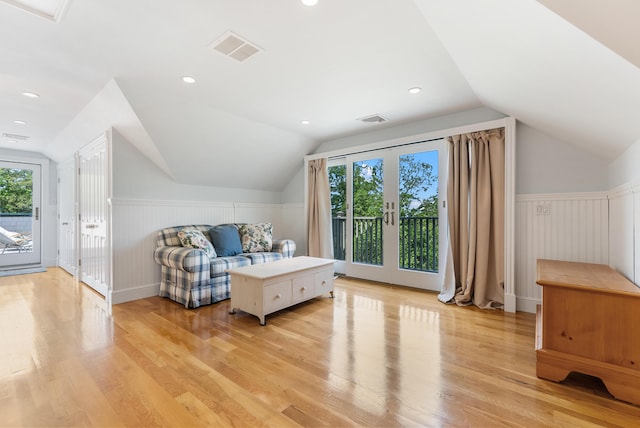 23 Crowell Ln, Tisbury, MA 02568 - bedroom featuring access to outside, french doors, vaulted ceiling, light wood finished floors, and wainscoting