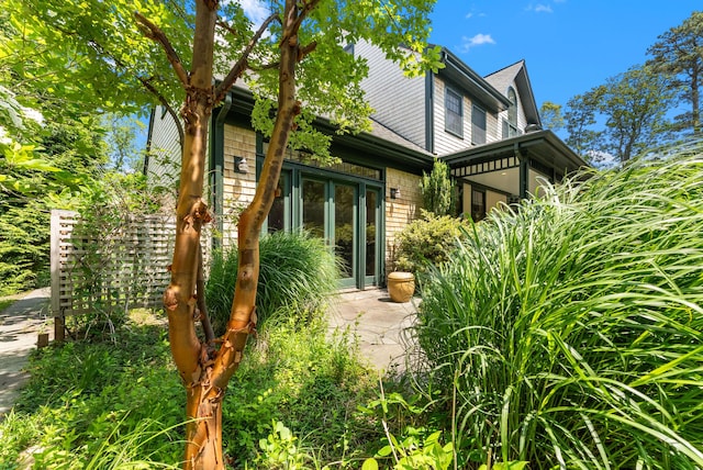 23 Crowell Ln, Tisbury, MA 02568 - back of property with roof with shingles