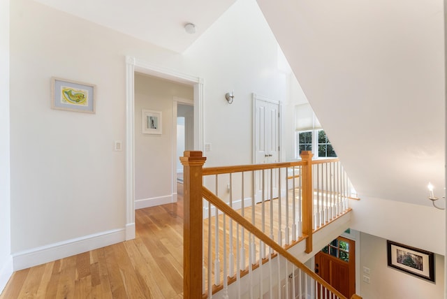 23 Crowell Ln, Tisbury, MA 02568 - hallway with an upstairs landing and light wood-style flooring