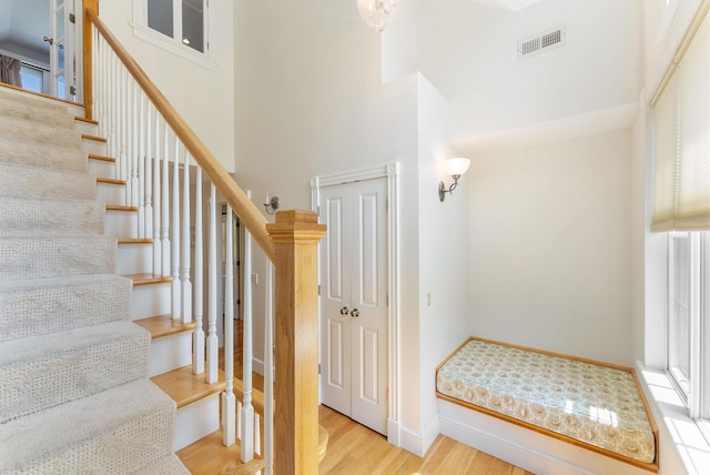 23 Crowell Ln, Tisbury, MA 02568 - stairs with wood finished floors and a high ceiling