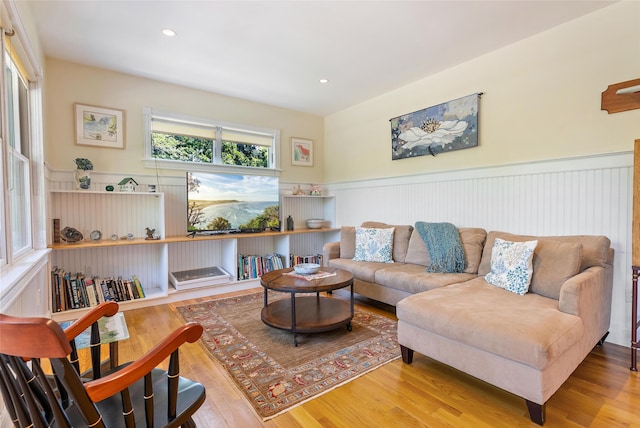 23 Crowell Ln, Tisbury, MA 02568 - living room featuring wainscoting, wood finished floors, and recessed lighting