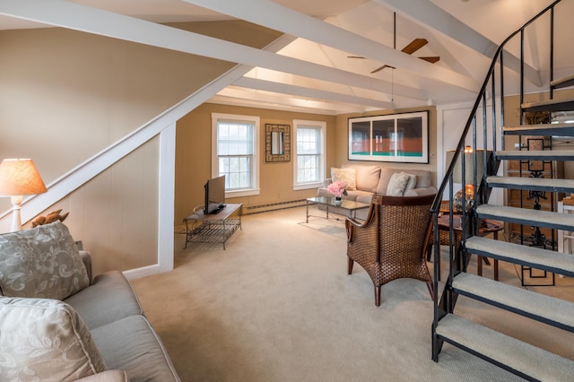 44 Commercial St, Provincetown, MA 02657 - carpeted living room with stairs, a baseboard radiator, and ceiling fan