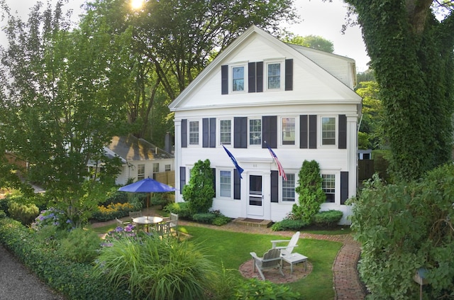 44 Commercial St, Provincetown, MA 02657 - neoclassical / greek revival house with a front lawn