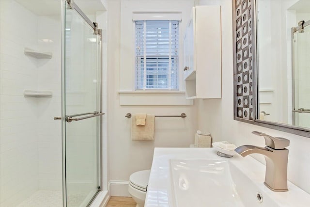44 Commercial St, Provincetown, MA 02657 - bathroom with a sink, a shower stall, and toilet