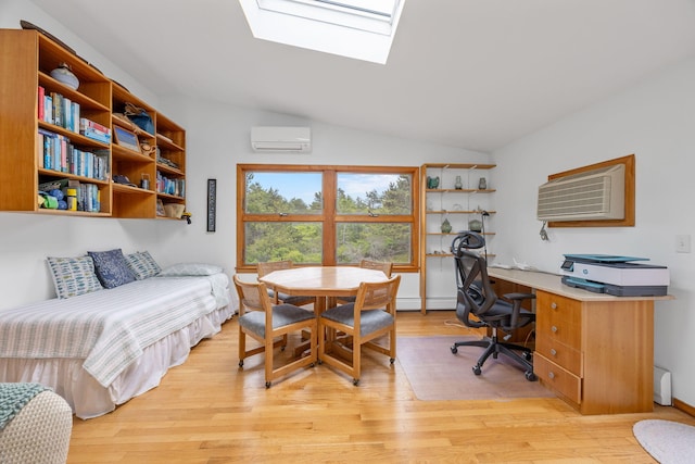 5 Great Hills Rd, Truro, MA 02666 - office with a wall unit AC, light wood-style floors, a baseboard radiator, vaulted ceiling, and a skylight