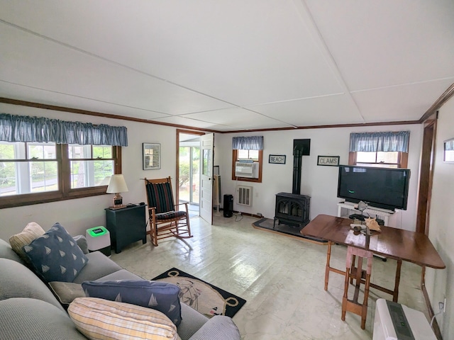 62 Old Fish House Rd, South Dennis, MA 02660 - living area with a wood stove and crown molding