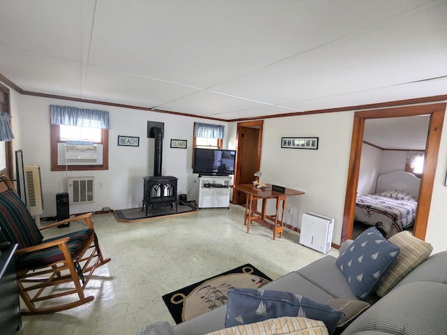 62 Old Fish House Rd, South Dennis, MA 02660 - living area with ornamental molding, a wood stove, and cooling unit