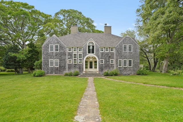 20 James Pond Way, West Tisbury, MA 02575 - shingle-style home featuring a front lawn, a chimney, and roof with shingles
