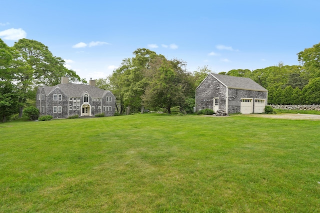 20 James Pond Way, West Tisbury, MA 02575 - view of grassy yard featuring an outbuilding and driveway