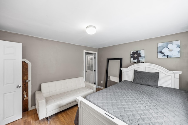 239 Upper County Rd, South Dennis, MA 02660 - bedroom featuring wood finished floors and baseboards