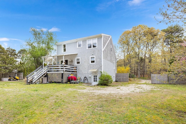 239 Upper County Rd, South Dennis, MA 02660 - rear view of house with a wooden deck and stairs