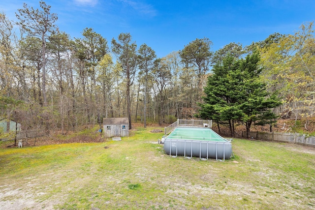 239 Upper County Rd, South Dennis, MA 02660 - view of yard with a storage unit and an outdoor structure