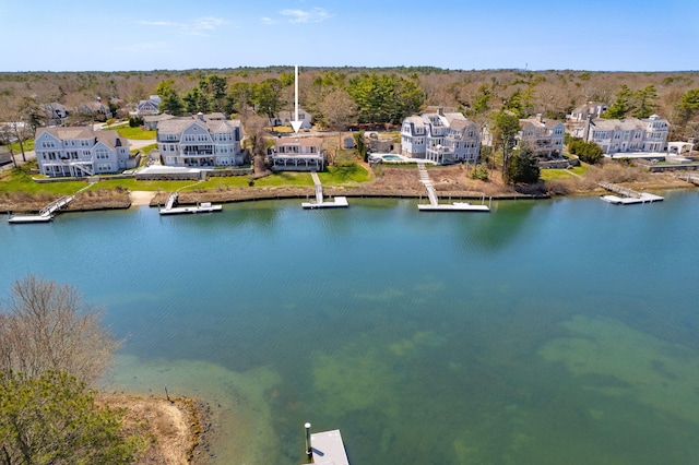 aerial view featuring a residential view and a water view