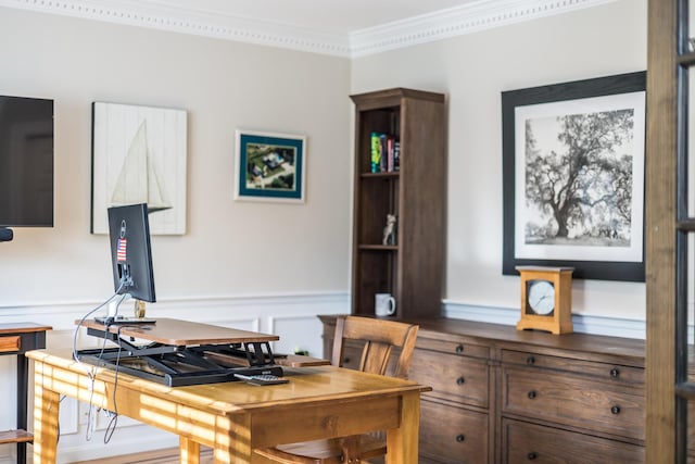 office space with a wainscoted wall and ornamental molding