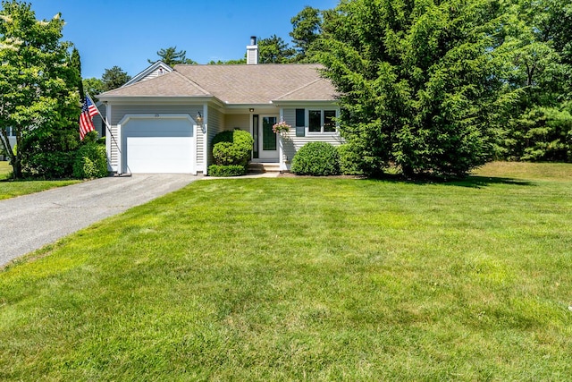 ranch-style house with aphalt driveway, an attached garage, a chimney, and a front yard