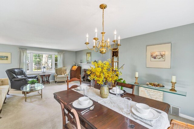 33 Swift Brook Rd, South Yarmouth, MA 02664 - dining area with light carpet and a chandelier
