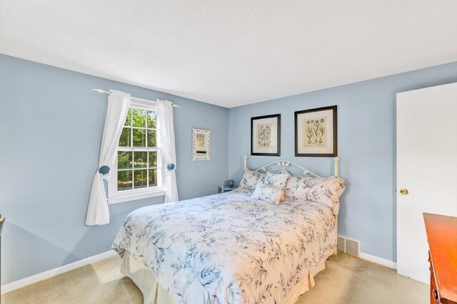 33 Swift Brook Rd, South Yarmouth, MA 02664 - bedroom featuring light colored carpet