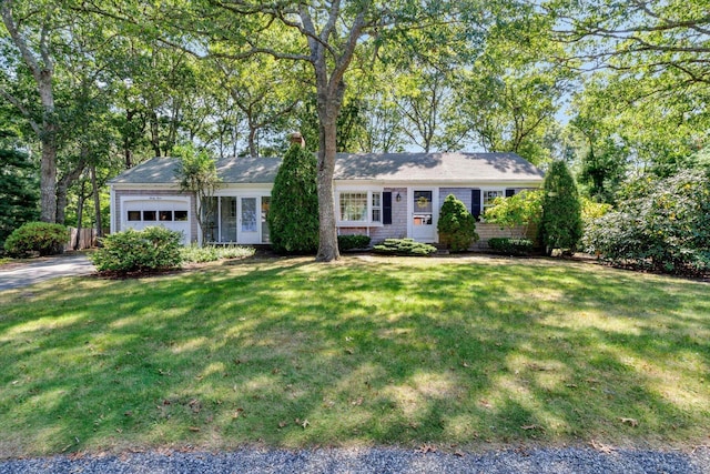 33 Swift Brook Rd, South Yarmouth, MA 02664 - ranch-style home with a garage and a front yard
