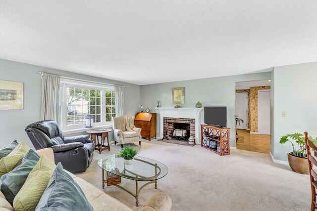 33 Swift Brook Rd, South Yarmouth, MA 02664 - living room featuring light colored carpet and a brick fireplace