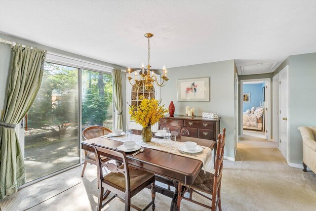 33 Swift Brook Rd, South Yarmouth, MA 02664 - carpeted dining space with a chandelier