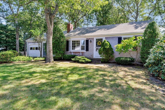 33 Swift Brook Rd, South Yarmouth, MA 02664 - ranch-style house featuring a garage and a front lawn