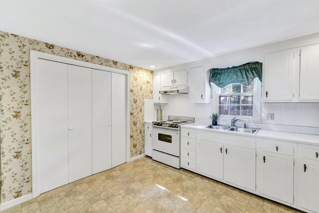 33 Swift Brook Rd, South Yarmouth, MA 02664 - kitchen with backsplash, sink, white cabinets, and white electric stove