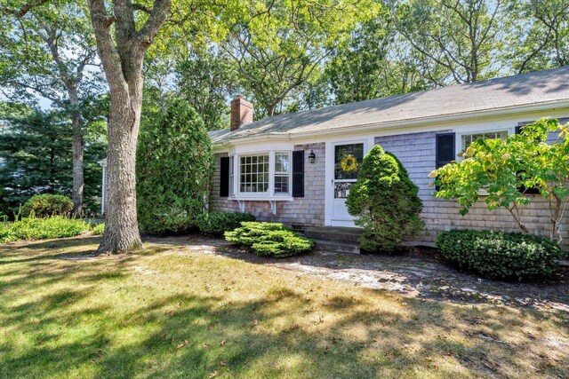33 Swift Brook Rd, South Yarmouth, MA 02664 - ranch-style house featuring a front yard