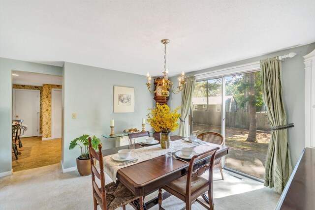 33 Swift Brook Rd, South Yarmouth, MA 02664 - dining space featuring a notable chandelier and a textured ceiling