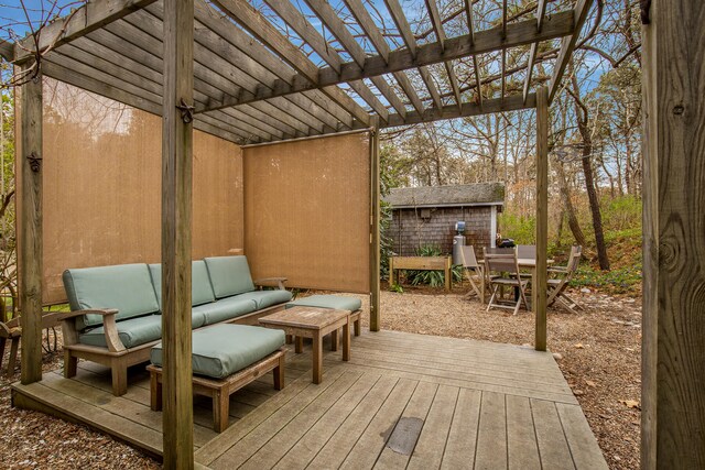 deck with a pergola and an outdoor hangout area