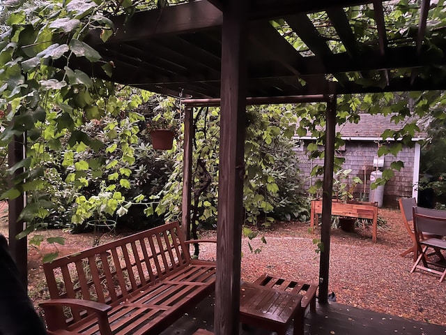 wooden deck with a pergola