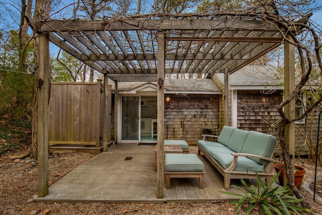 view of patio / terrace featuring outdoor lounge area, fence, a pergola, and a deck