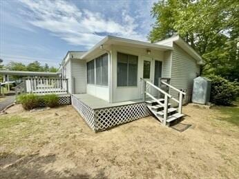 37 Washington Park, Carver, MA 02330 - back of property with entry steps and a deck