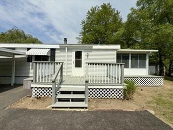 37 Washington Park, Carver, MA 02330 - back of property featuring a deck and an attached carport