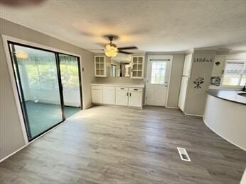 37 Washington Park, Carver, MA 02330 - unfurnished living room featuring wood finished floors and a ceiling fan