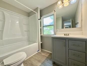 37 Washington Park, Carver, MA 02330 - bathroom featuring vanity, wood finished floors, and shower / bathtub combination
