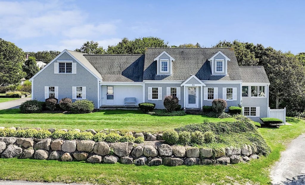 73 E Bay View Rd, Dennis, MA 02638 - cape cod home with a front lawn