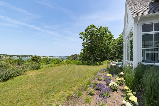 view of yard featuring a water view