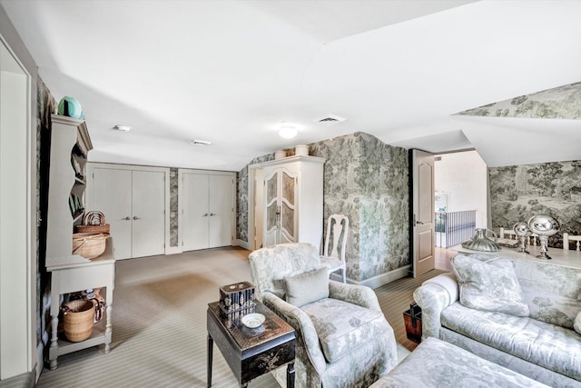 living room featuring vaulted ceiling