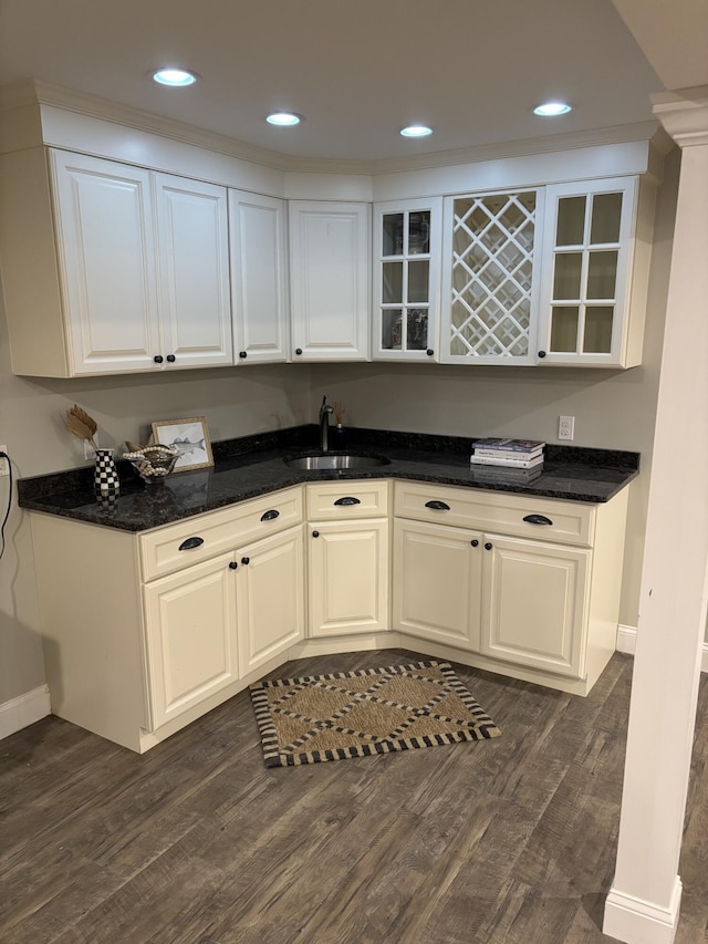 23 Ridgehill Ln, Sagamore Beach, MA 02562 - kitchen with a sink, dark wood-type flooring, glass insert cabinets, recessed lighting, and baseboards