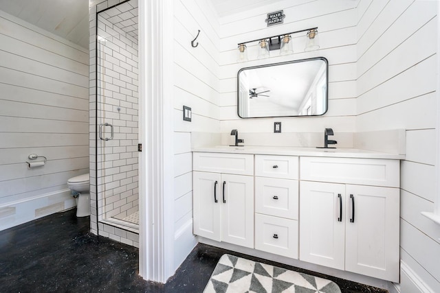 bathroom featuring a shower with shower door, vanity, and wood walls