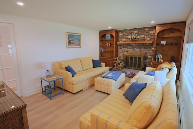 25 Skerry Rd, South Dennis, MA 02660 - living room with wood finished floors, recessed lighting, a brick fireplace, and baseboards