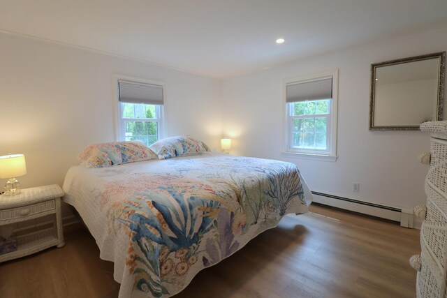 25 Skerry Rd, South Dennis, MA 02660 - bedroom with a baseboard radiator, wood finished floors, and recessed lighting