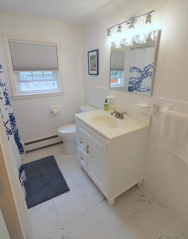 25 Skerry Rd, South Dennis, MA 02660 - full bathroom with a baseboard radiator, marble finish floors, tile walls, vanity, and toilet