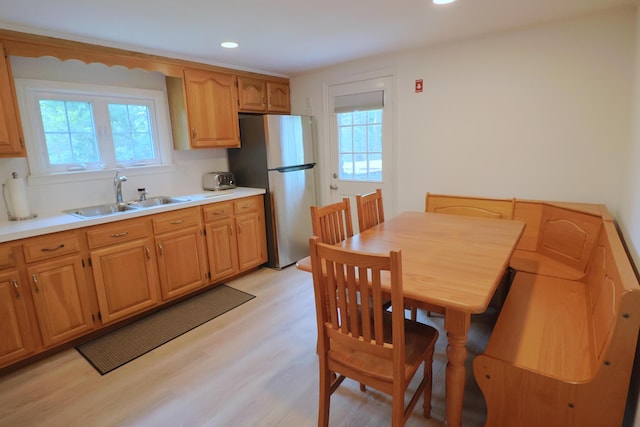 25 Skerry Rd, South Dennis, MA 02660 - kitchen featuring a sink, freestanding refrigerator, healthy amount of natural light, light wood-style flooring, and recessed lighting
