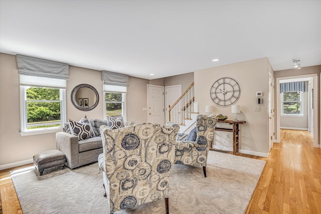 26 Sandy Meadow Way, Eastham, MA 02642 - living room featuring healthy amount of natural light, stairway, light wood-style flooring, and recessed lighting