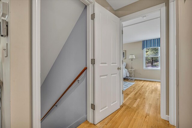 26 Sandy Meadow Way, Eastham, MA 02642 - corridor featuring an upstairs landing and light wood-type flooring