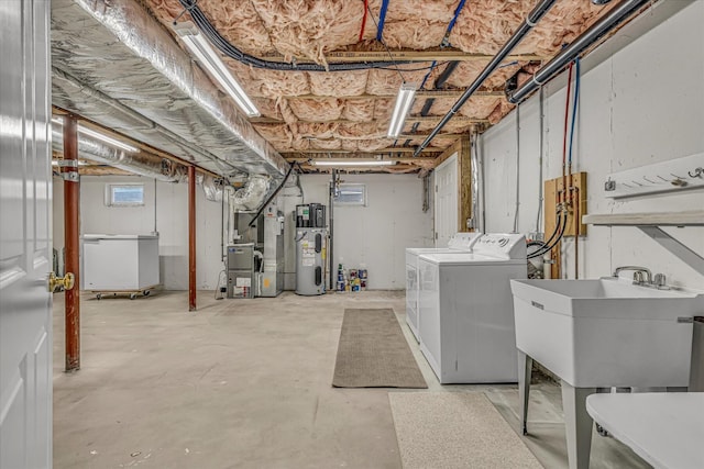 26 Sandy Meadow Way, Eastham, MA 02642 - below grade area with heating unit, independent washer and dryer, and hybrid water heater